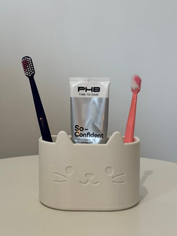 porta escovas e pasta de dente em formato de gatinho